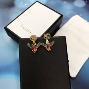 Aretes GG con piedra y rosa