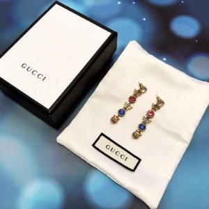 Aretes GG con piedra zirconia mariposa